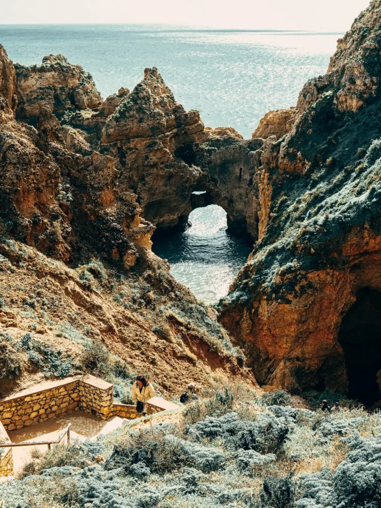Ponte da Piedade in Lagos, spectacular rock formations overlooking the ocean, sunny and serene atmosphere.