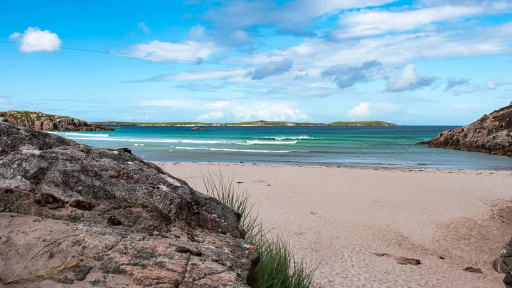 Sangomore Beach sandy beach turquoise water rocks Durness