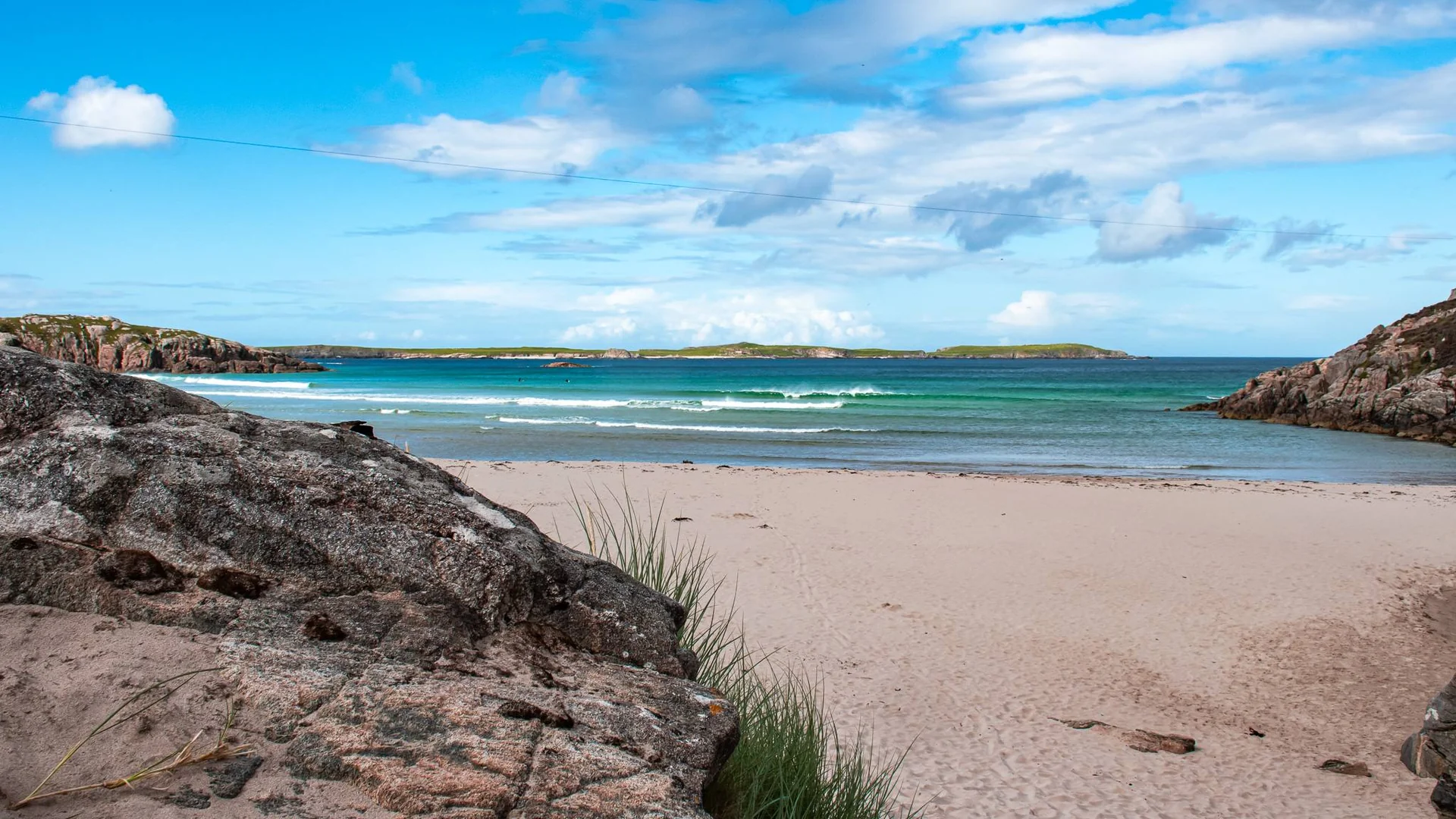 Sangomore Beach sandy beach turquoise water rocks Durness