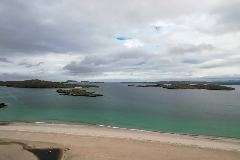 Harris Island beach rocky islets light sand