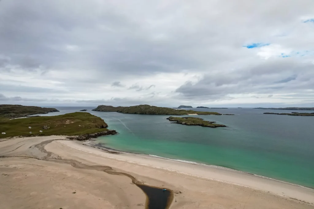 Fine sandy beach turquoise waters Isle of Harris wild landscape