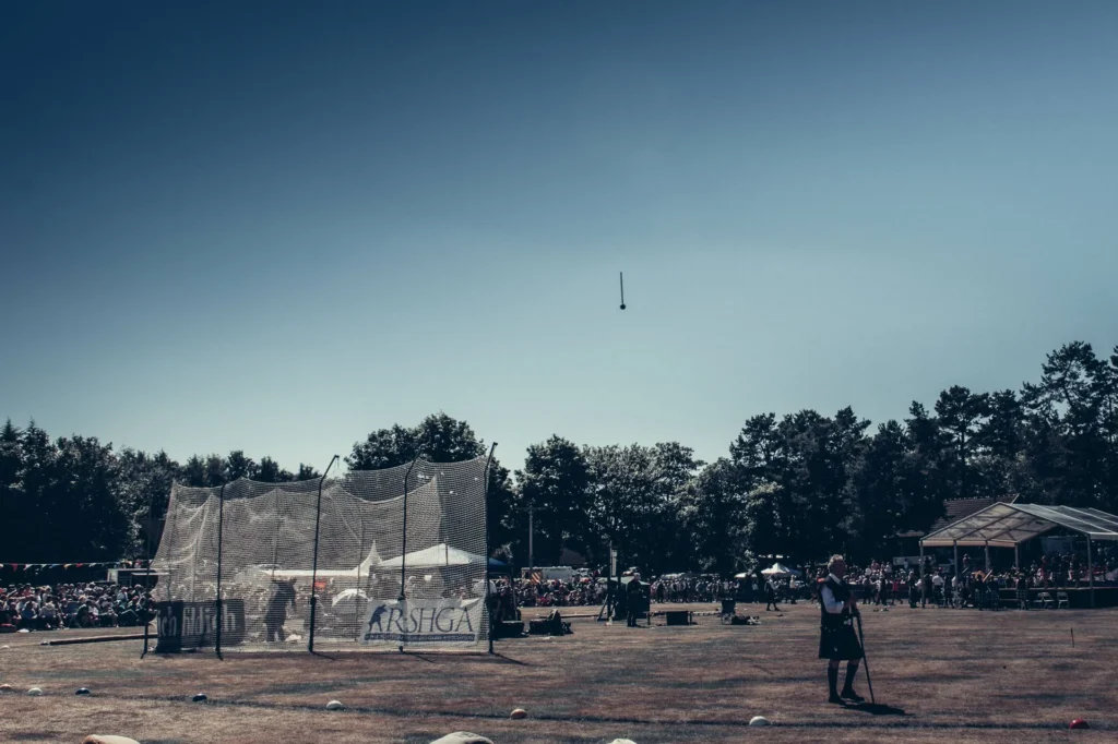 Overview of the Highland Games field in Scotland with hammer throw