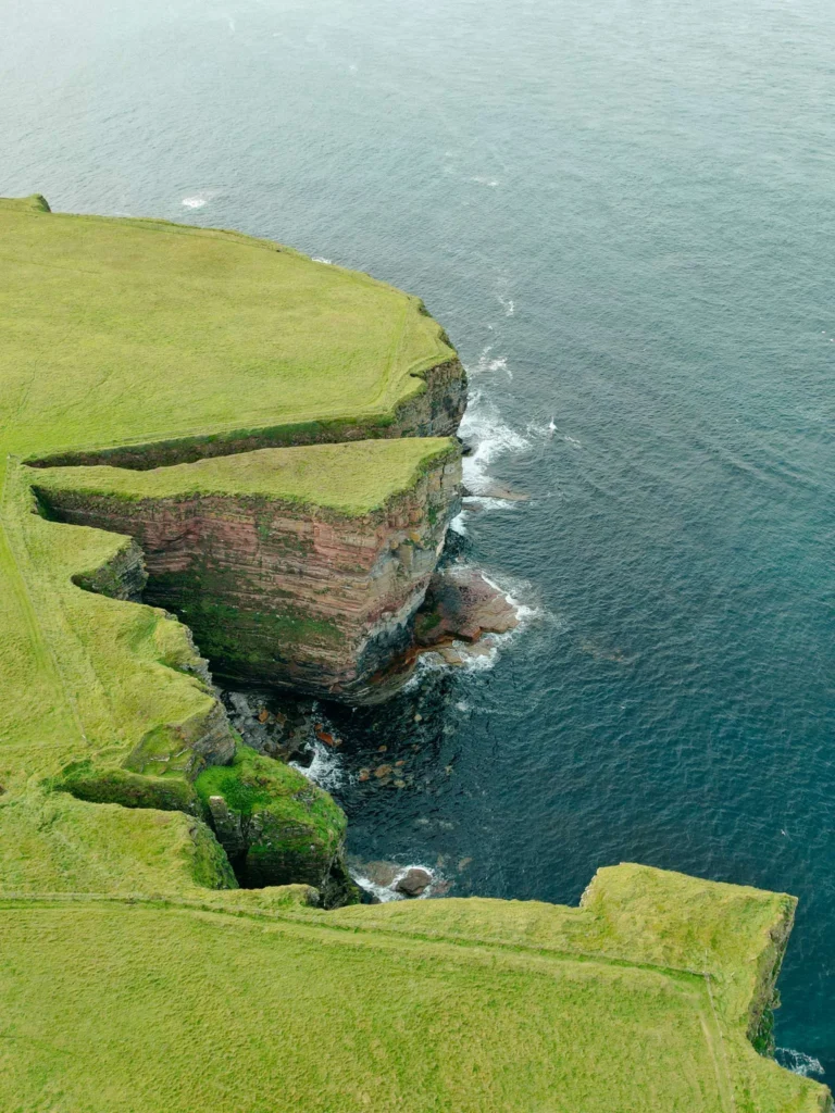 Green cliffs John O'Groats facing the sea Scotland