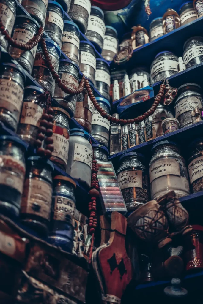 Display of spice and herb jars in a souk in Marrakech.
