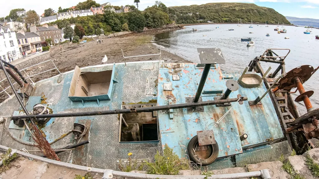 Rusty boat wreck Portree harbor Isle of Skye