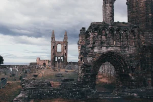 Ruins of St Andrews Cathedral with cemetery in the background in Scotland