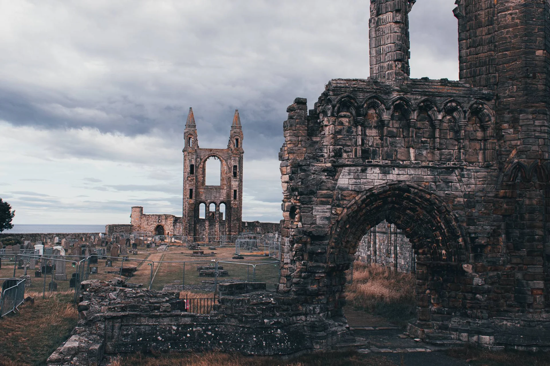 Ruins of St Andrews Cathedral with cemetery in the background in Scotland
