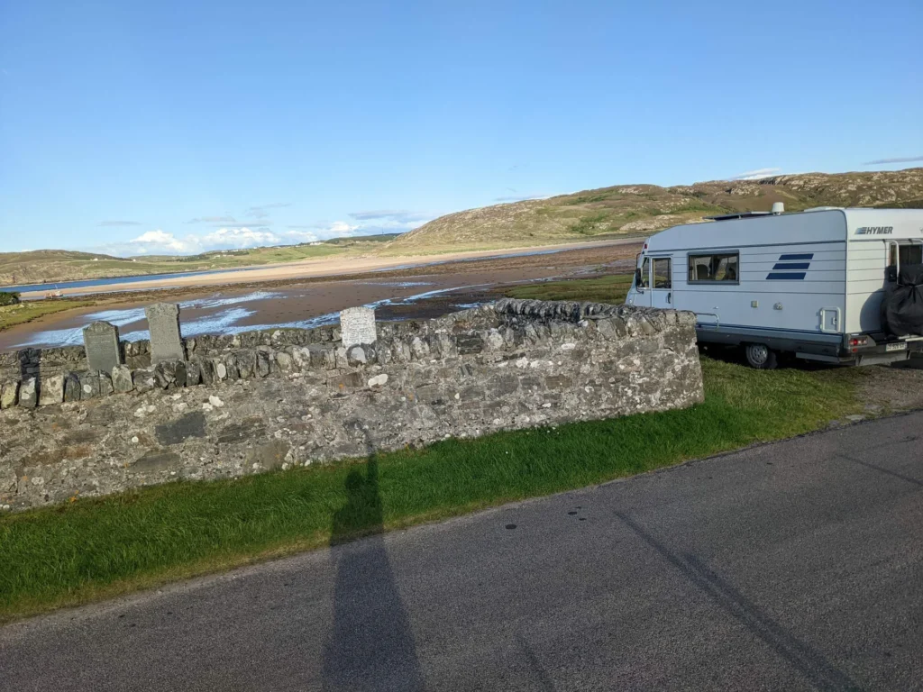 Hymer motorhome stone wall beach low tide Tongue