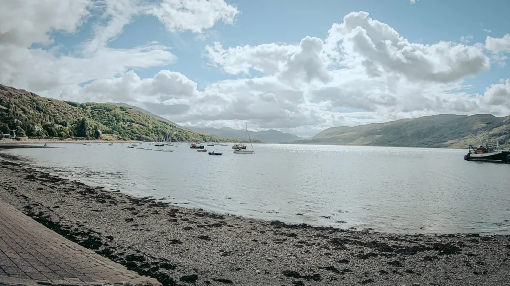 Ullapool shoreline sailing boats green hills