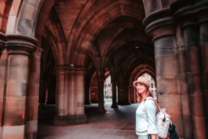 Caroline under the Gothic arches of the University of Glasgow