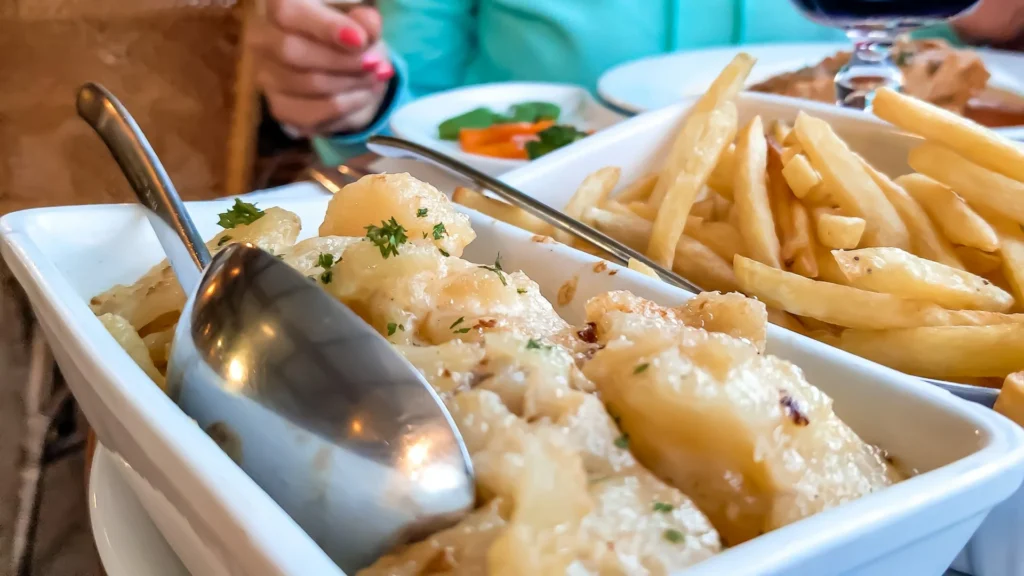 Potato gratin plate with fries on the side at the French restaurant in Wick