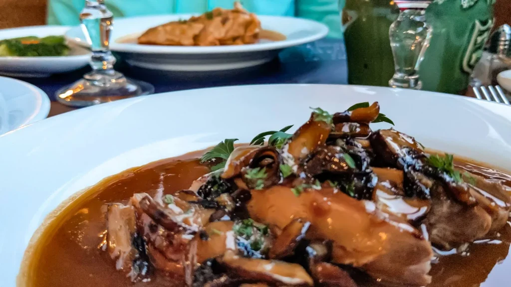 Plate of pheasant supreme in mushroom sauce at the French restaurant in Wick