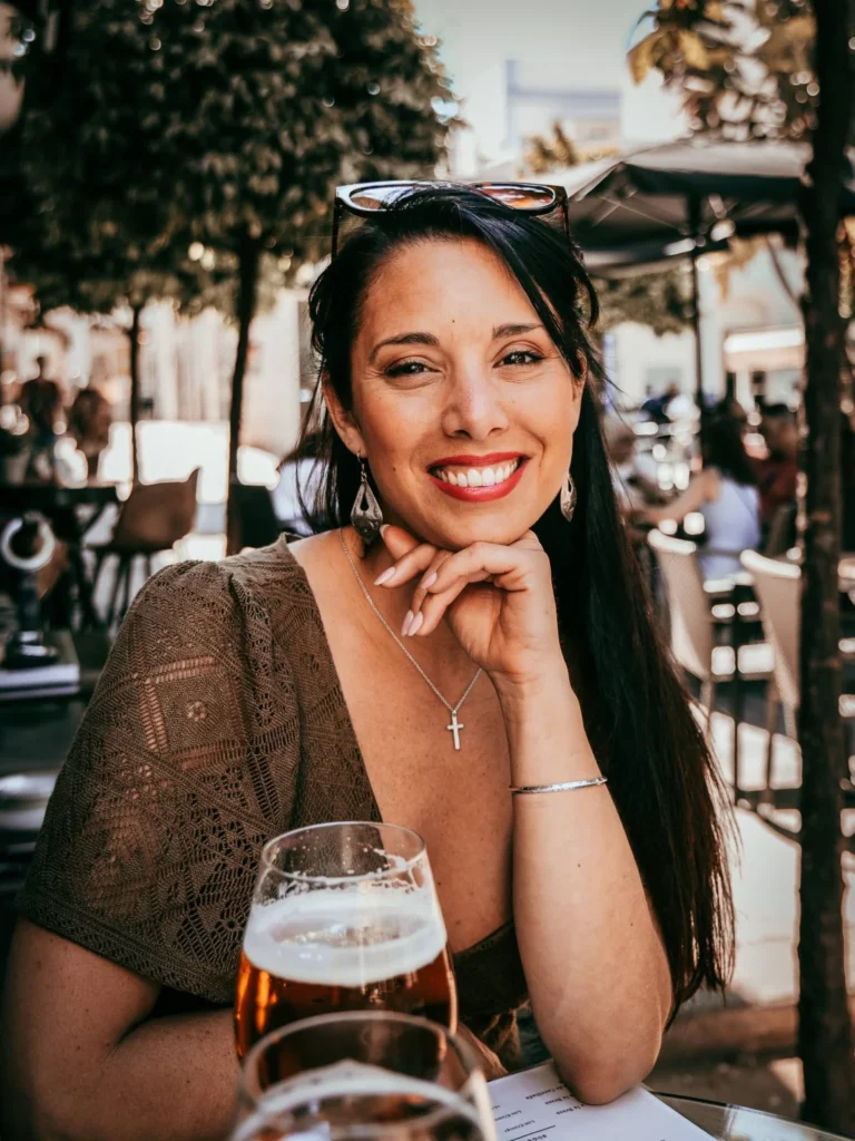 Caroline, co-founder, on a sunny terrace in the Algarve