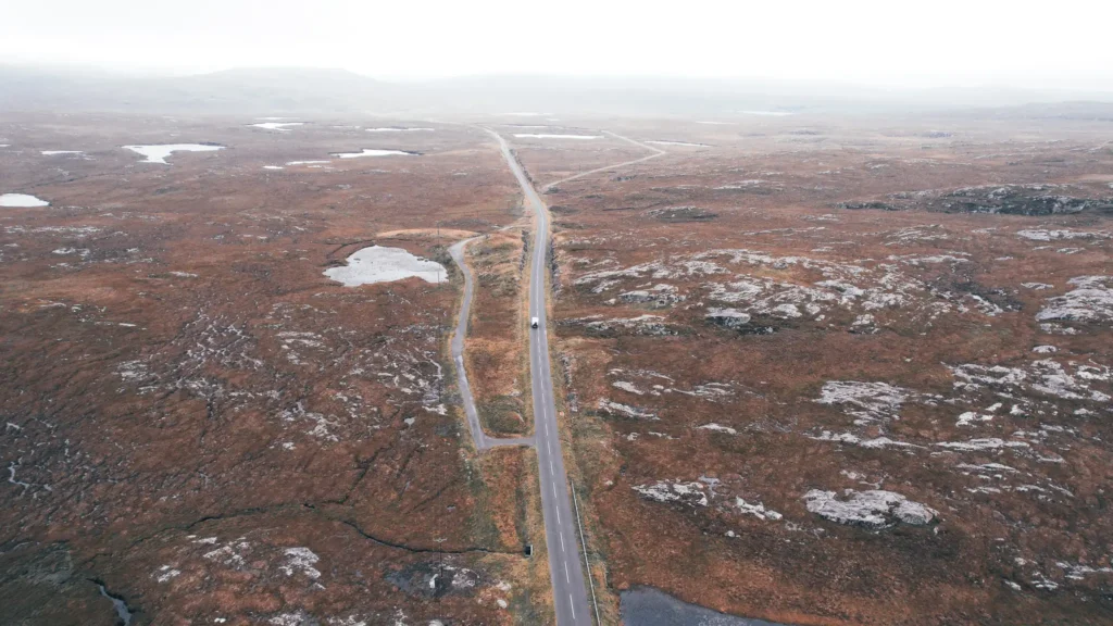Solitary road trip with our camper van through the wild and misty landscapes of the Scottish Highlands.