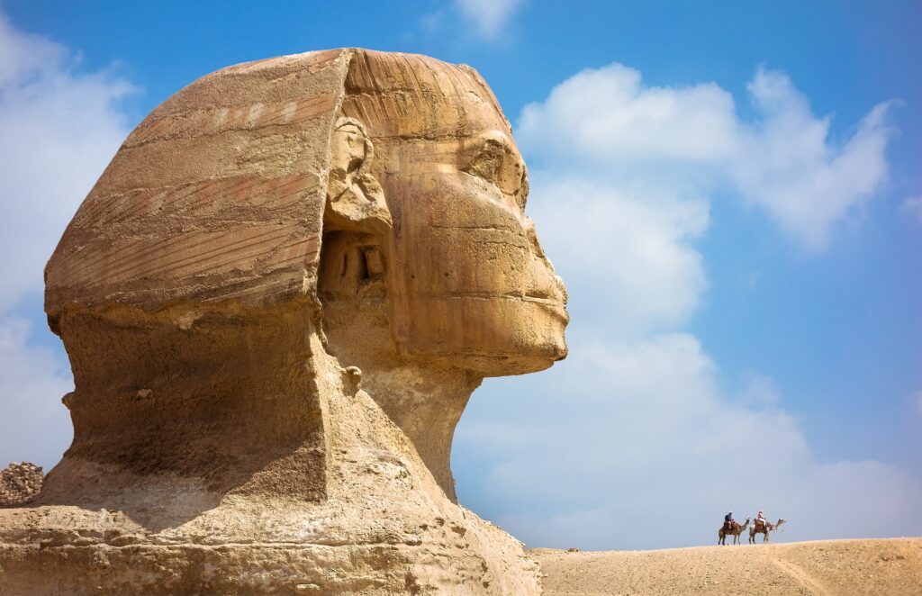 The Great Sphinx of Giza in front of the pyramids