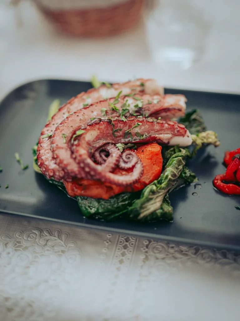 Roasted octopus dish at a restaurant in Tavira