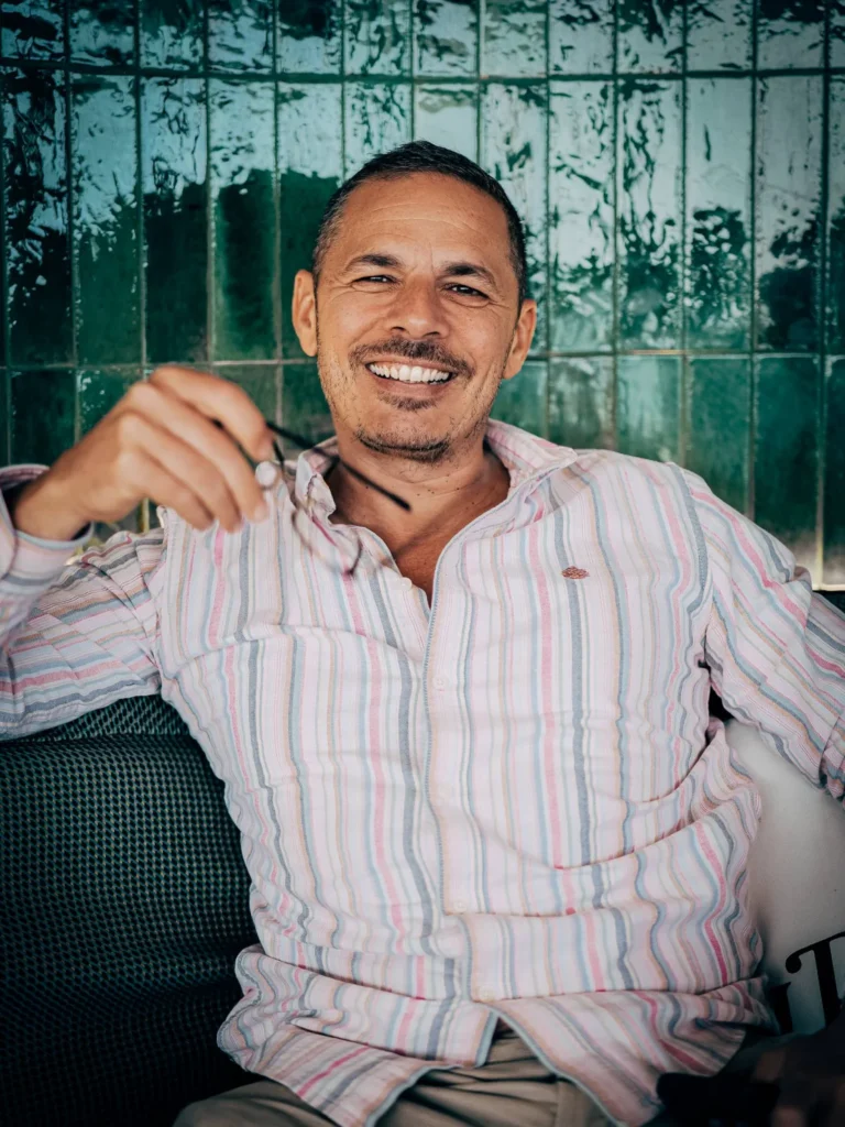 Xavier, co-founder of Planete de Caro and Vantour, in a restaurant in the Algarve