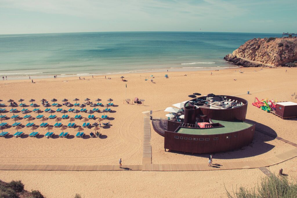 Albufeira beach with a circular wooden bar facing the Atlantic