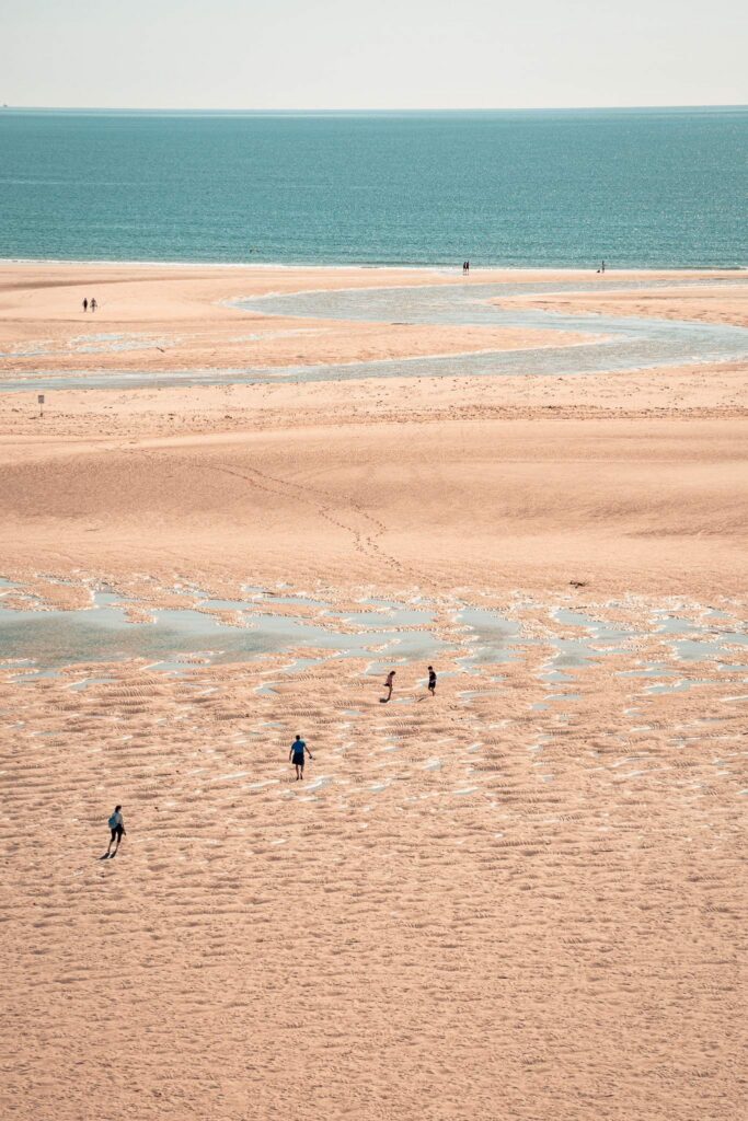 Wide sandy beach of Cacela Velha at low tide, view of the Atlantic Ocean