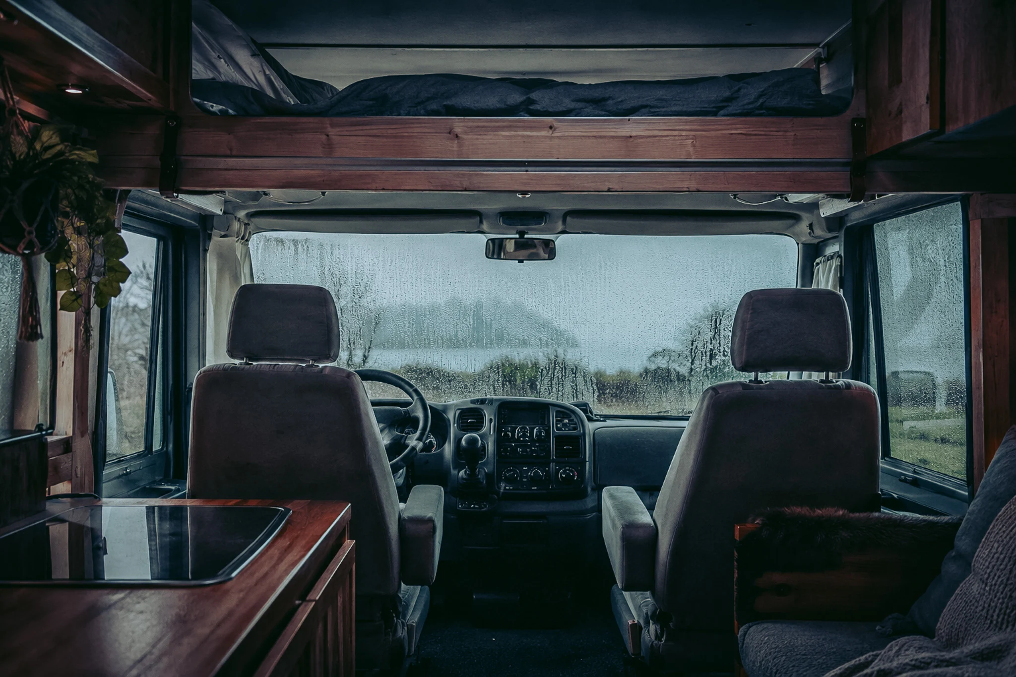 Condensation on the windscreen of a converted van on a winter morning