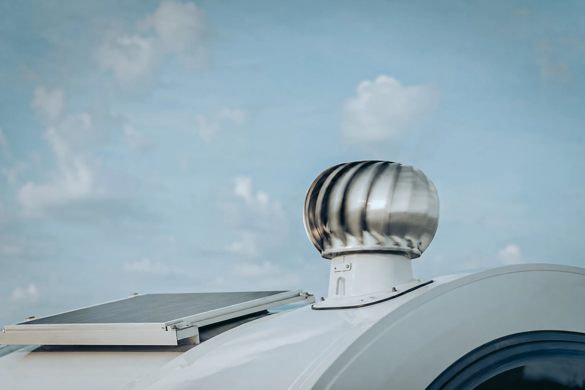 Wind turbine roof ventilator on the roof of a camper van