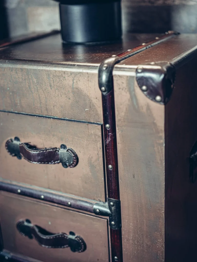 Detail of a wooden and leather storage unit in a room at the Allan Park Hotel in Stirling, Scotland, in August 2026.