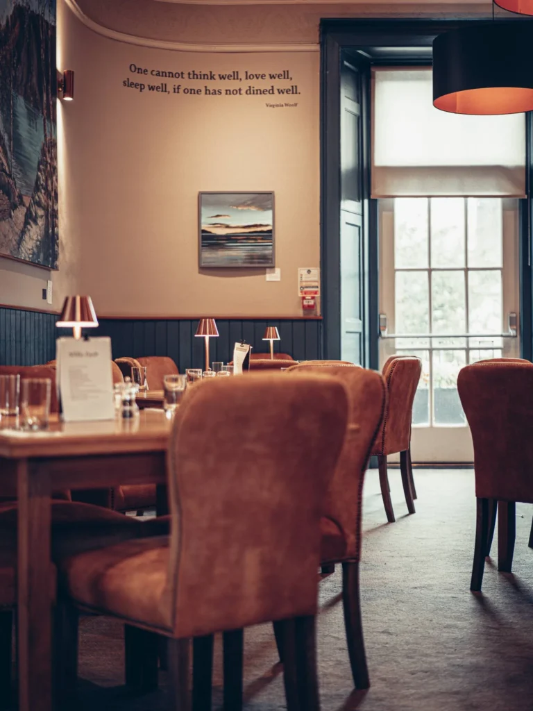 Restaurant hall of the Allan Park Hotel in Stirling, Scotland, with set tables and a warm atmosphere in August 2026.