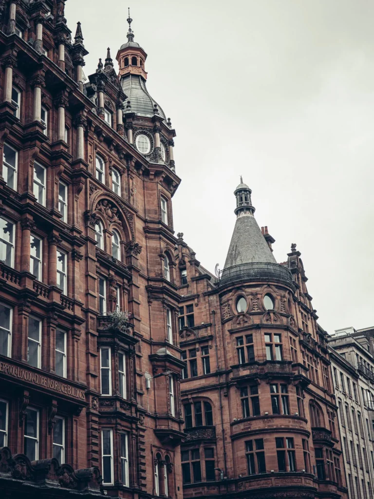 Victorian red sandstone building facades in Glasgow, with their bay windows.